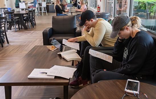 Students reading at the coffee shop